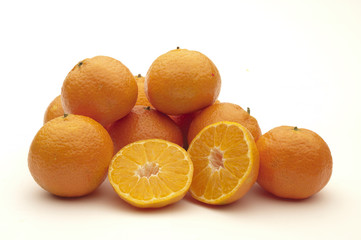 heap of tangerines on white