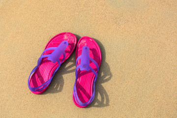 Sandals on the beach - concept image