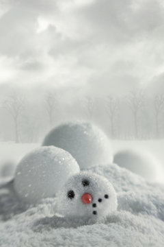 Broken snowman in snow
