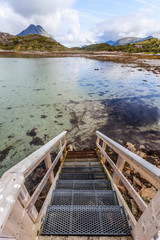 pontile sulla costa,porto con barche,spiaggia lofoten