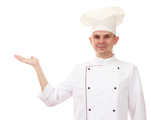 Portrait of chef holding something on his palm isolated on