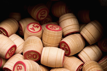 Lotto. Wooden kegs in a sack