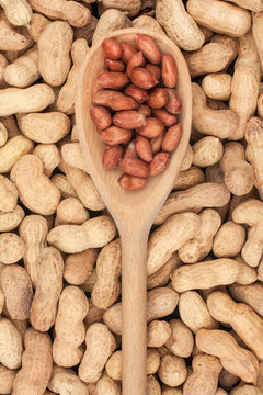 Wooden spoon with peanuts
