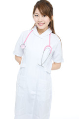 Beautiful asian nurse on white background