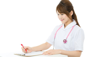 Beautiful asian nurse on white background