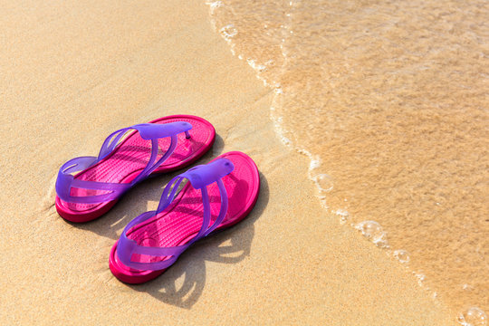 Sandals on the beach - concept image