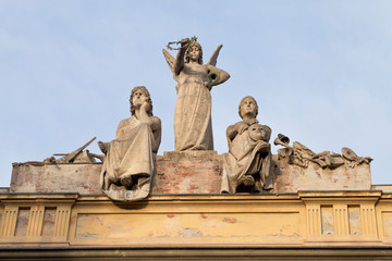 statue on roof of L' Arena del Sole - theater in Bologna