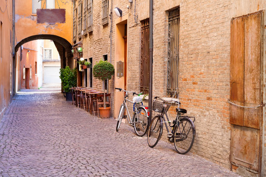 Fototapeta old small stone medieval street in historical center