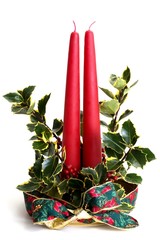 Christmas decoration with candles and holly