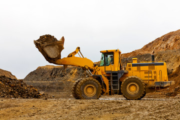 Yellow bulldozer in quarry © Alex Ad Photography