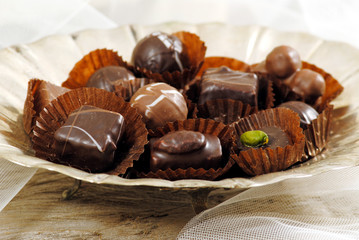 Assorted chocolate pralines in silver plate