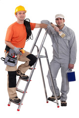 Painter and electrician by ladder