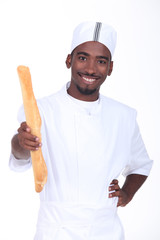 Baker holding a baguette