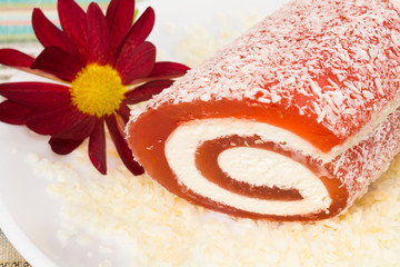 red sweet dessert with flower in a plate