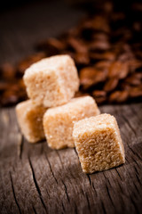 Macro shot of brown sugar on wooden surface