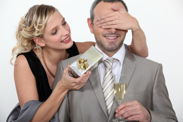 a wife making a surprise to her husband