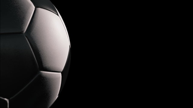 Soccer ball, Rotation on black background, loop