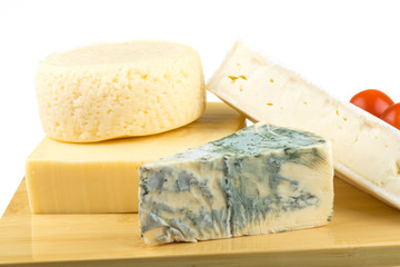 Variety of cheese: ementaler, gouda, Danish blue soft cheese and