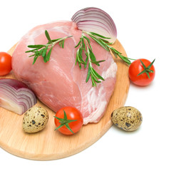 piece of meat, vegetables and eggs on a white background