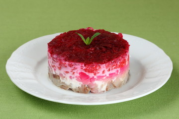Traditional Russian salad with herring.