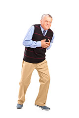 Full length portrait of a mature man having a heart attack