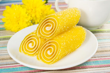 yellow Fruit Candy on a plate, closeup