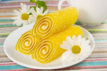 yellow Candy on a plate, closeup