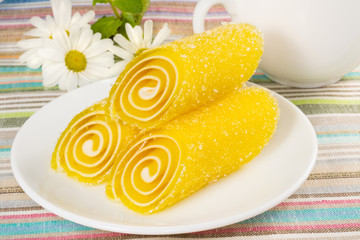 yellow candy fruit on a plate