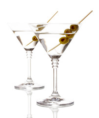 Martini glasses and olives isolated on white