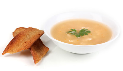 Fragrant soup with garlic croutons isolated on white