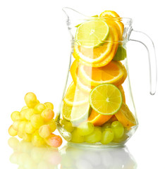 transparent jar with citrus fruits and grape, isolated on white