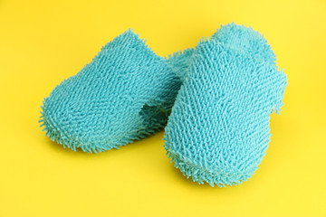 bright slippers, on yellow background