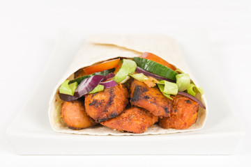 Chicken Tikka Wrap: Tandoori chicken and salad in a flatbread