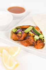 Chicken Tikka Wrap: Tandoori chicken and salad in a flatbread