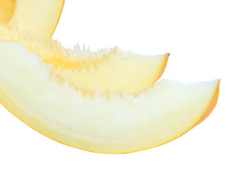 Sliced of ripe melon with over white.Isolated