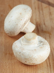 Fresh mushrooms on the kitchen board