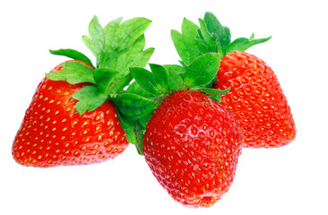 Three fresh strawberries. Isolated