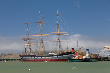 Fototapeta premium Steamer and vintage clipper in the port
