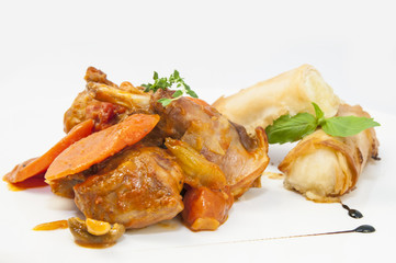 Тушеный кролик с сырными рулетиками