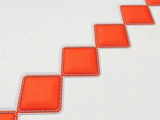 Plexiglas foto achterwand Lederen achtergrond met rode gestikte ruiten © Arsgera