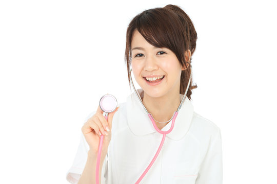 Beautiful asian nurse on white background