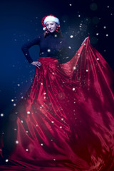 Fototapeta na wymiar Romantic beauty woman in elegant red dress. Professional makeup