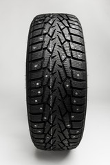 winter tire on grey background