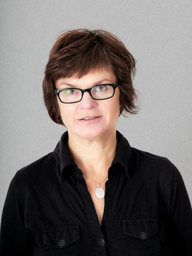 Woman with glasses in middle age