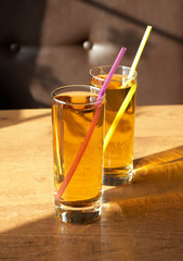 Two glasses  of fresh apple  juice.