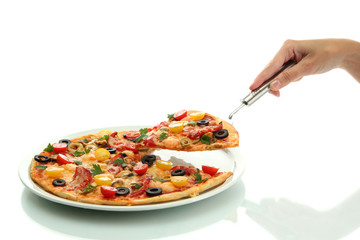 woman's hand holding a slice of pizza