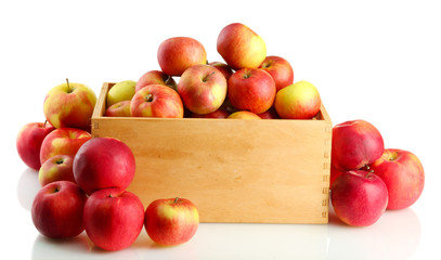 juicy apples in wooden crate, isolated on white