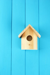 Nesting box on wooden background