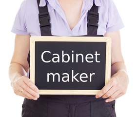Craftsperson with blackboard: cabinet maker