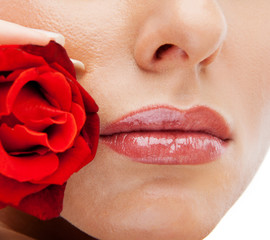 Close up of lips with rose